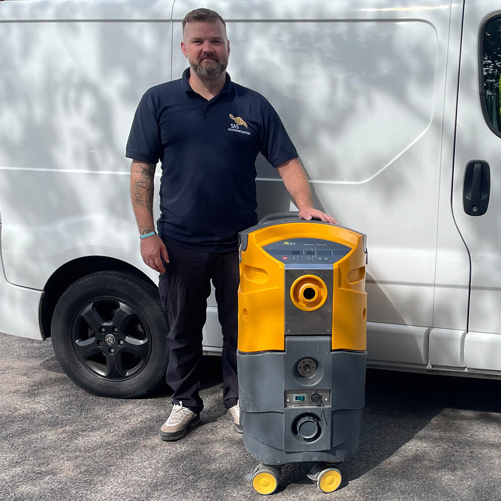 Sean from SAS Precision Floor Care with the van and cleaning machine